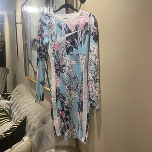 Two colorful brand new Nike tight fit stretch cute casual chill dresses.